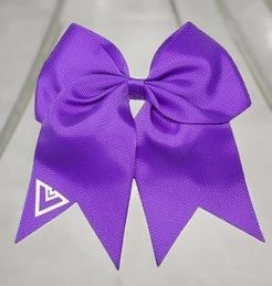 Purple bow with a logo on a light gray background