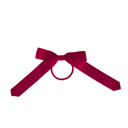 A deep magenta satin bow with a central loop, shown on a plain white background.